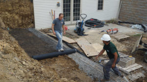 rolling out geo grid retaining wall